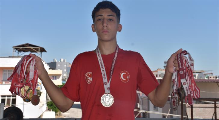 Evinin damında başladığı güreşte milli formayı terletecek